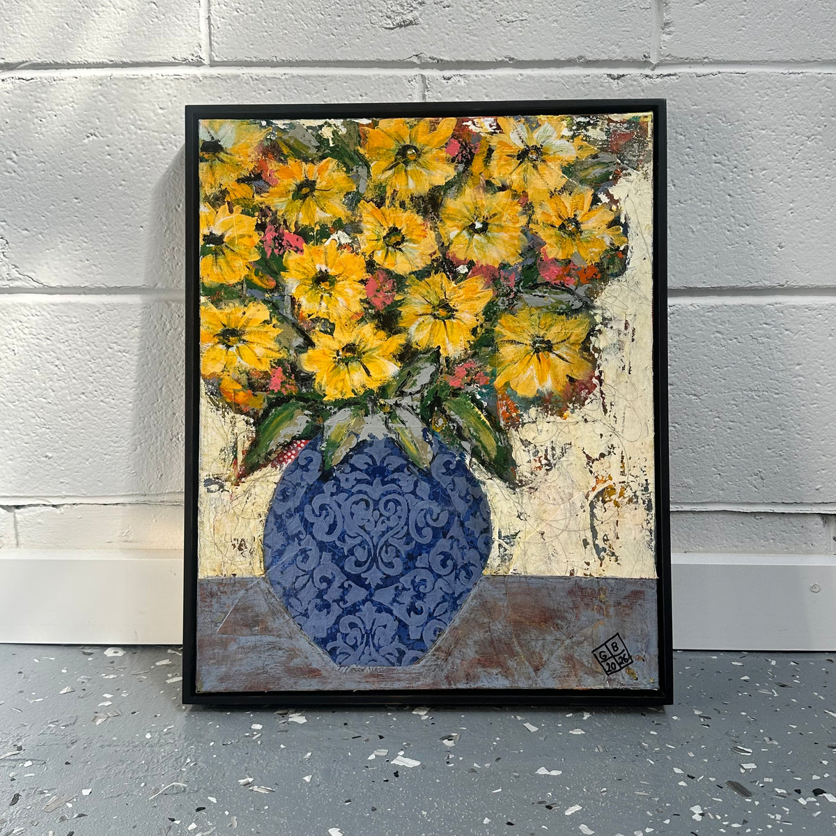 GEORGINA BARNETT Yellow flowers in a decorative blue vase