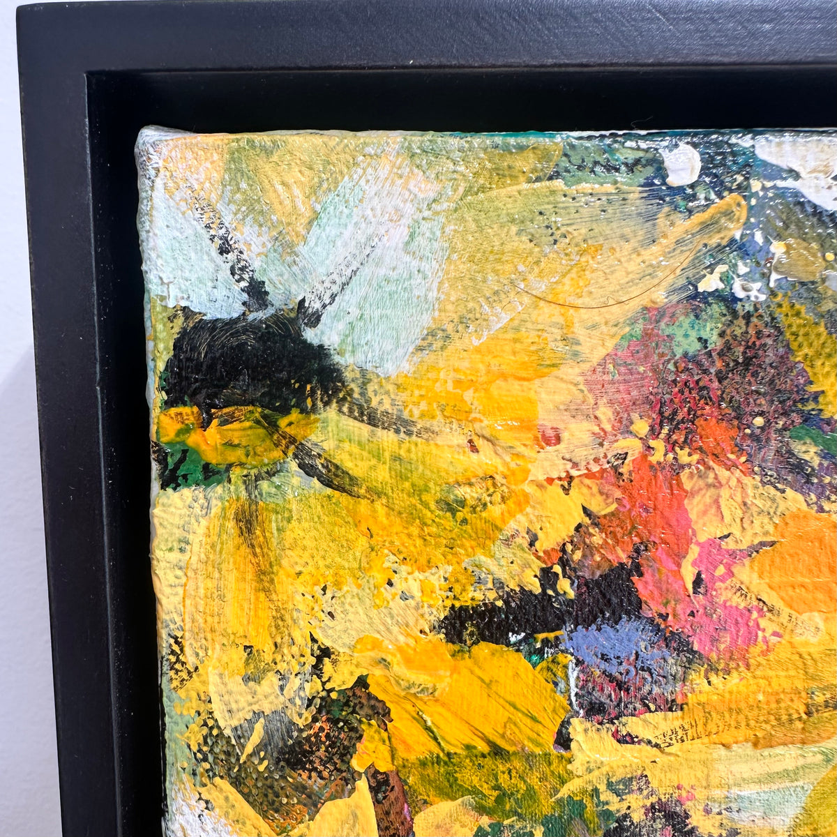 GEORGINA BARNETT Yellow flowers in a decorative blue vase